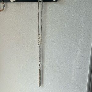 Long gold and silver colored necklace